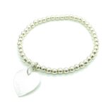 freudenschmuck-Duesseldorf-Kugelarmband-Silberanhaenger-Herzanhaenger-geschliffen